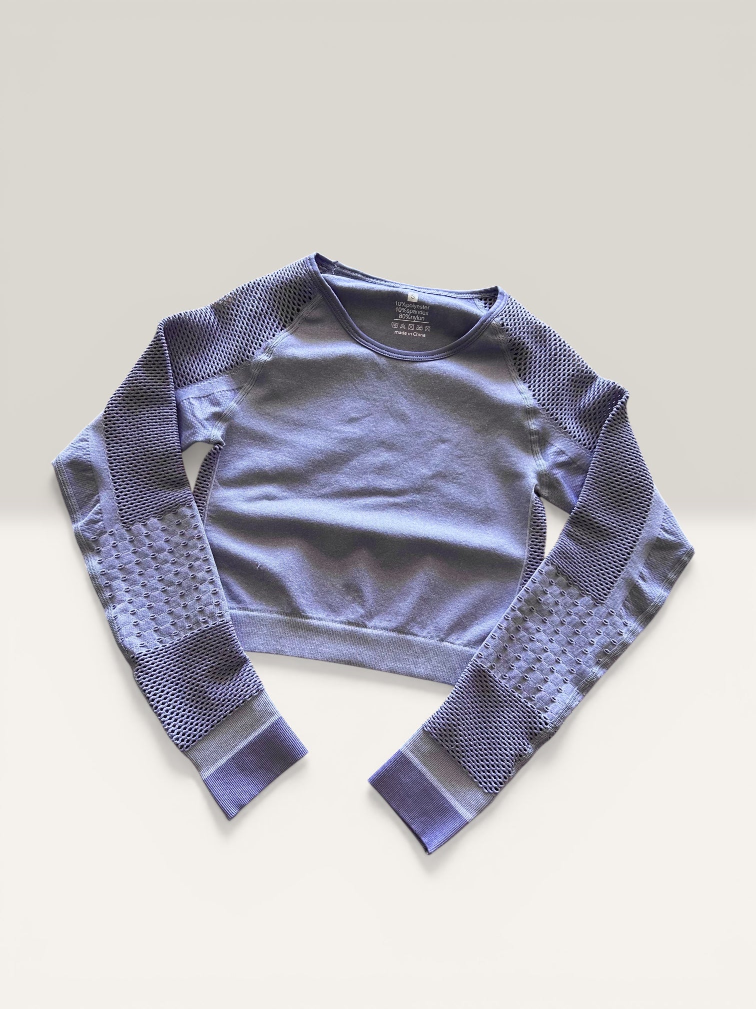 Crop top manga larga