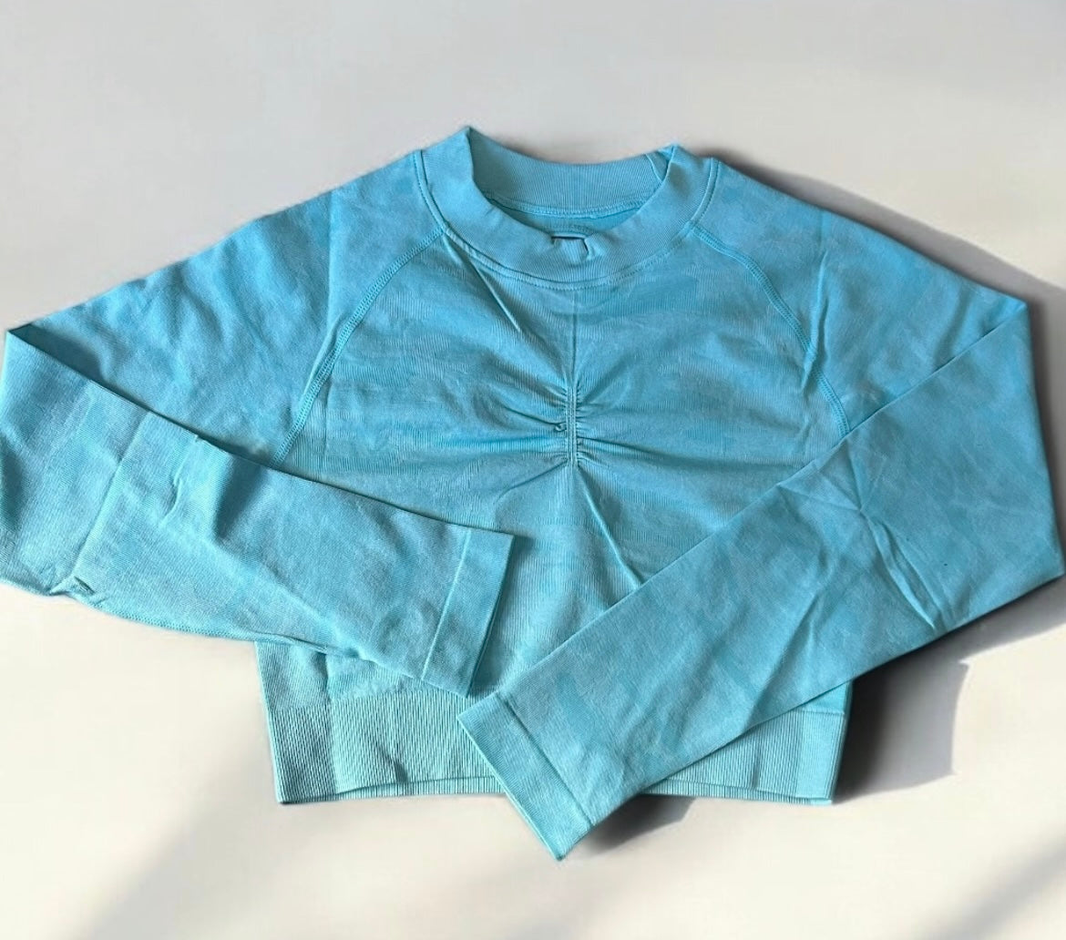 Crop top manga larga