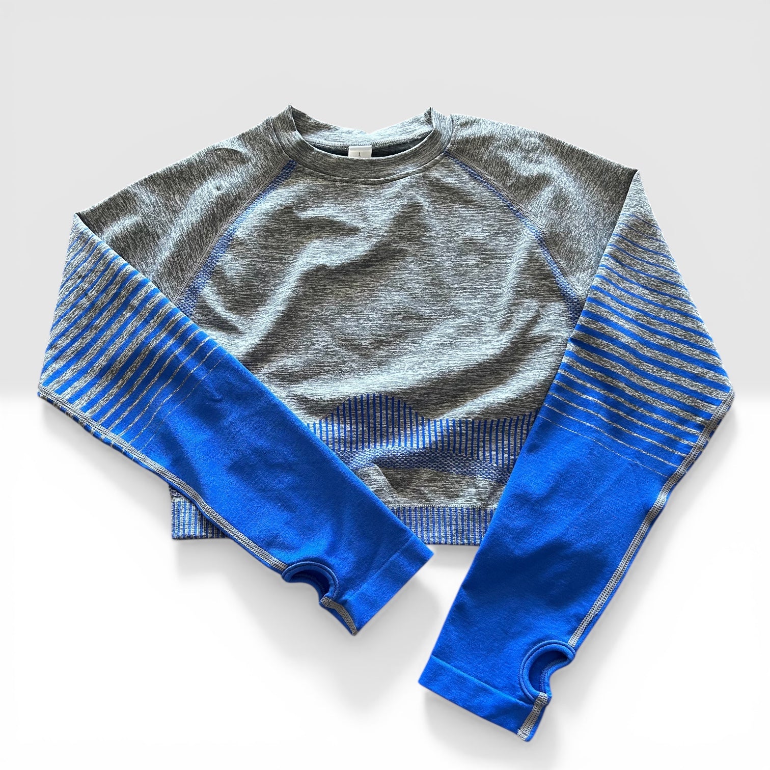 Crop top manga larga