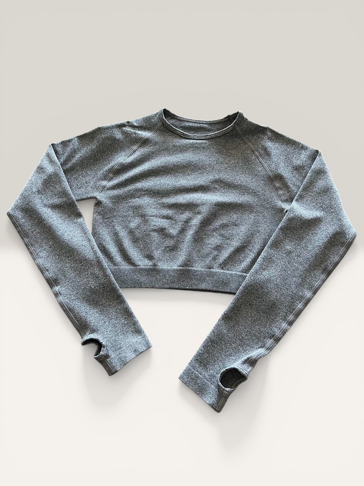 Crop top manga larga