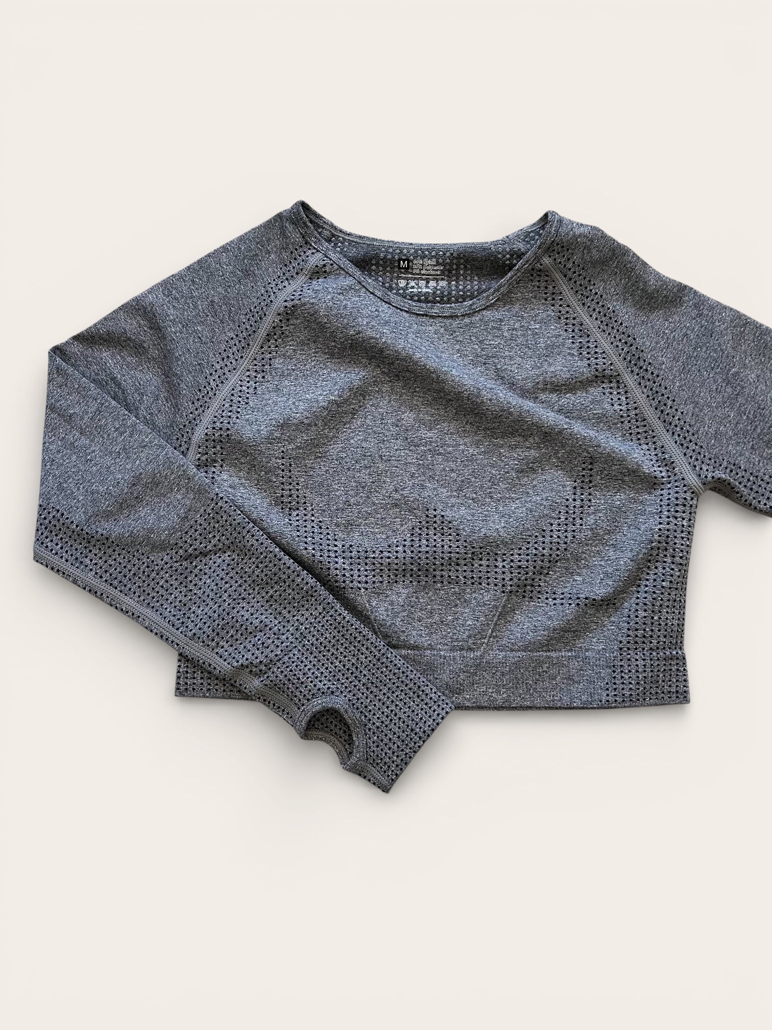 Crop top manga larga